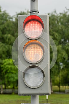 The traffic light is red and yellow, and the stop signal