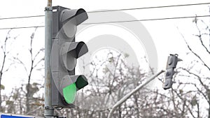 Traffic light on the road regulates traffic