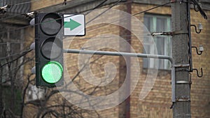 Traffic light on the road regulates traffic