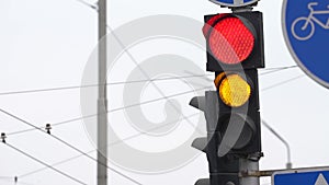 Traffic light on the road regulates traffic