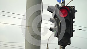 Traffic light on the road regulates traffic