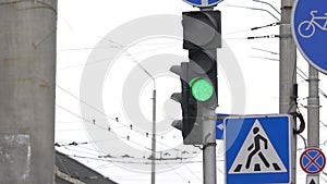 Traffic light on the road regulates traffic