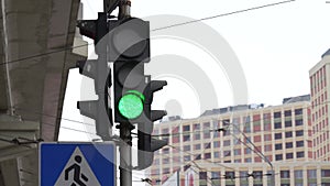 Traffic light on the road regulates traffic