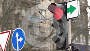 Traffic light on the road regulates traffic