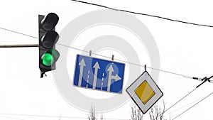 Traffic light on the road regulates traffic