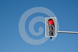 Traffic light with a blue sky