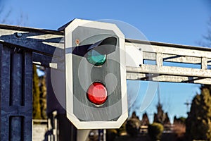 Traffic light shows green signal on railway.