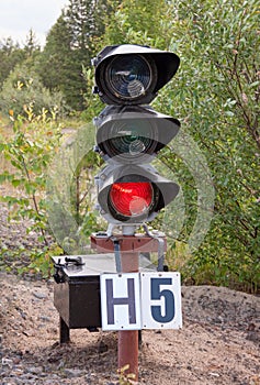 Traffic light shows red signal on railway