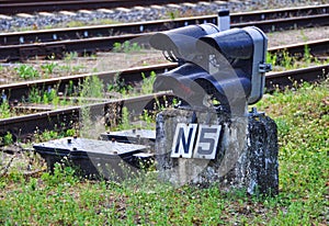 Traffic light shows red signal on railway