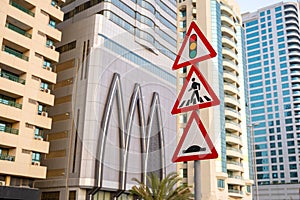 Traffic Light Sign. A road sign warning of a traffic light ahead. Speed Bump. Pedestrian crossing and speed bump sign traffic