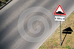 Traffic Light Sign. A road sign warning of a traffic light ahead. Speed Bump. Pedestrian crossing and speed bump sign traffic sign