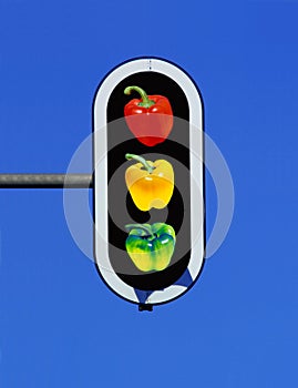traffic light with three bell peppers, paprika in red, yellow and green