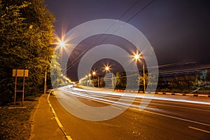 Traffic light trails on the turning road at Voronezh street