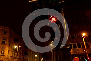 Traffic lights for bicycles at night in the city. Red light for sports concept.