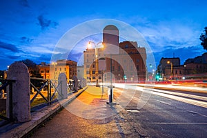 Traffic lights at the Colosseum at dawn in Rome, Italy