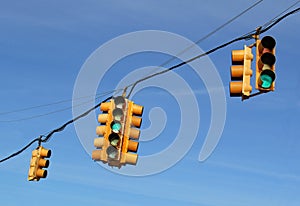 Traffic lights in front of blue sky