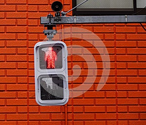 Traffic lights for pedestrian showing the red