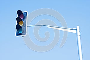 Traffic lights under the blue sky