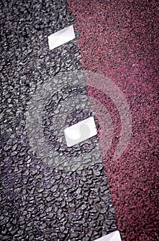 Traffic lines on the asphalt road surface is composed of one type of background./ Traffic lines.