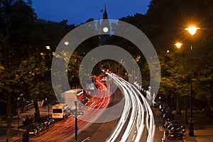 Traffic in London, light streaks at dusk.