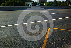 Traffic marking line on empty road bokeh background