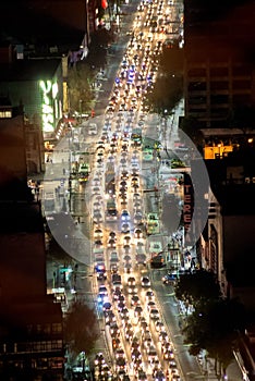 Traffic in mexico city view from torre latinoamericana with close up at night and the lights of the cars