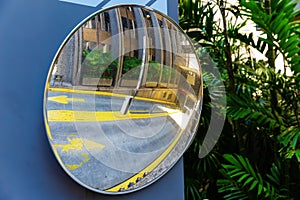 Traffic mirror at the driveway of an underground parking garage