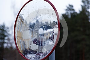 Traffic mirror in a winter residential area in Umea