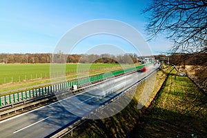 Traffic on motorway with motion blurred cars