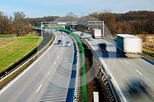 Traffic on motorway with motion blurred cars