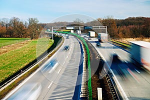 Traffic on motorway with motion blurred cars