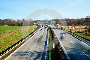 Traffic on motorway with motion blurred cars