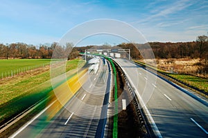 Traffic on motorway with motion blurred cars