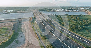 Traffic on the motorway in the road Alfred E. Driscoll Bridge over the water across Raritan River with heavy traffic on