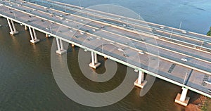 Traffic on the motorway in the road Alfred E. Driscoll Bridge over the water across Raritan River with heavy traffic on