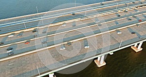 Traffic on the motorway in the road Alfred E. Driscoll Bridge over the water across Raritan River with heavy traffic on