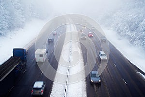 Traffic On Motorway During Snow Storm