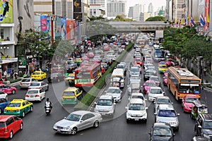 Traffic Moves Slowly on a Busy Road in Bangkok