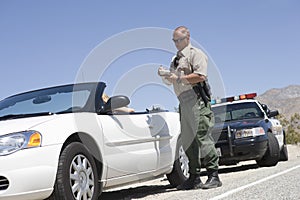 Traffic Officer Writing Ticket