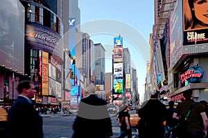 Traffic, people and advertising signs at Times Square in New York City