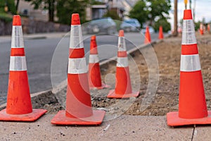 Traffic red cones on street warning construction works