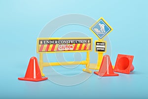 Traffic road barrier: A warning barrier for road closure and website under construction page. Includes warning and stop signs,