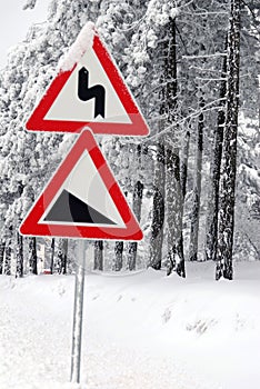 Traffic road sign in snow