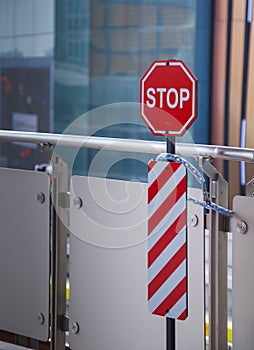 Traffic safety warning signage, A stop restrictive octagon sign with red, white vertical diagonal stripes striped delineators