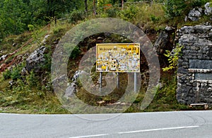 Traffic sign affixed with labels photo