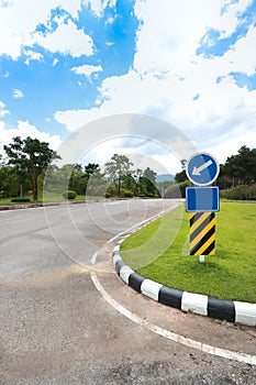 Traffic sign on beautiful mountain road