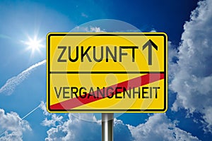 Traffic sign with the german words for future and past - zukunft und vergangenheit