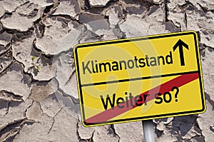 Traffic sign with CO2 Tax- Steuer and climate change - Klimawandel