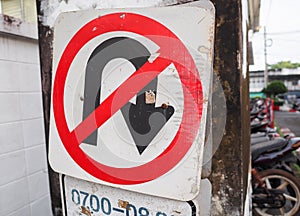Traffic sign of no u-turn on the road