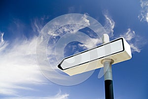 Traffic sign over a cloudy sky